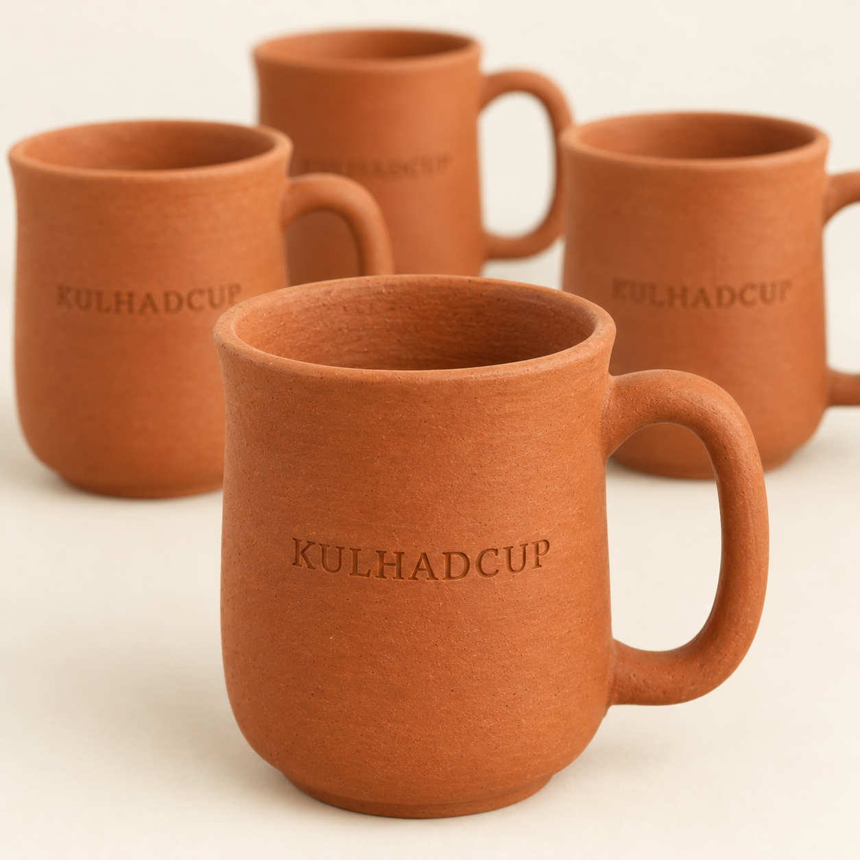 Close-up of kulhad mug with handle engraved with KulhadCup