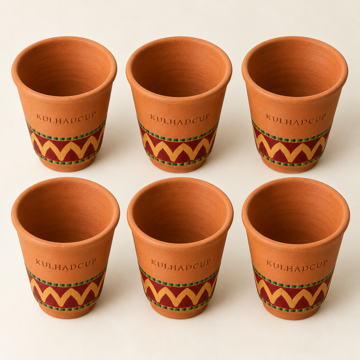 Top view of six maroon gold designer kulhads